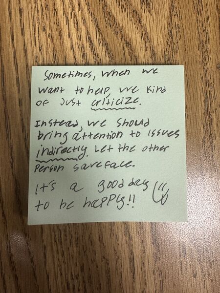 Handwritten sticky note with words of encouragement